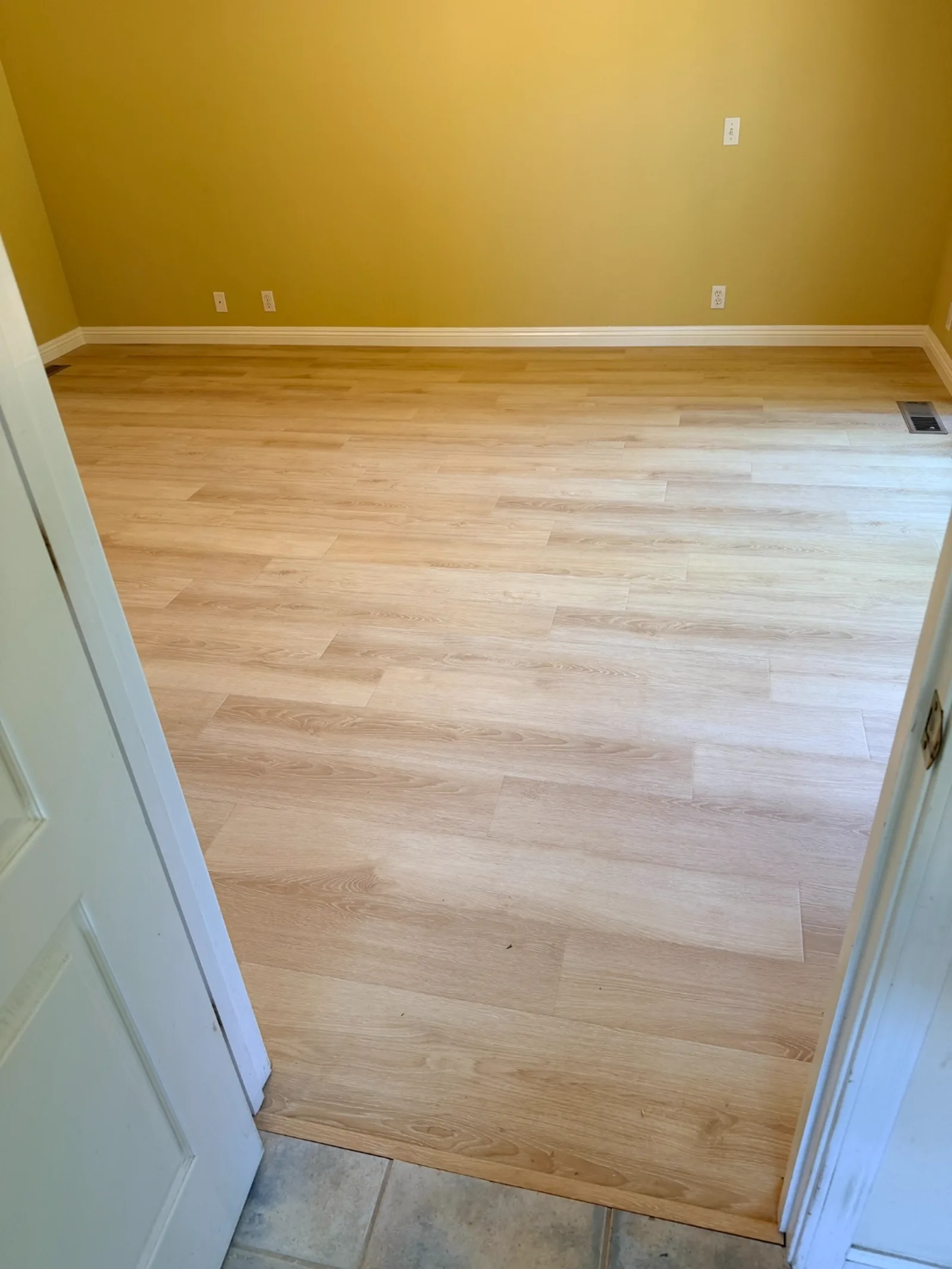 New flooring installed leading into hallway